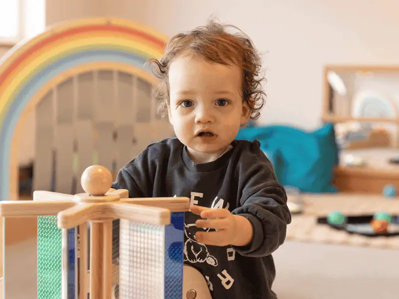 child-playing-with-wooden-toy (1)